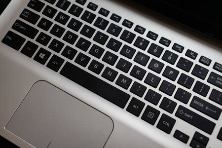 Writing on sticky note Well done! Text with Well done! on paper. Sticky note on keyboard.の写真素材