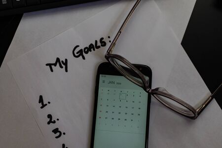 Writing on sticky note Well done! Text with Well done! on paper. Sticky note on keyboard.の写真素材