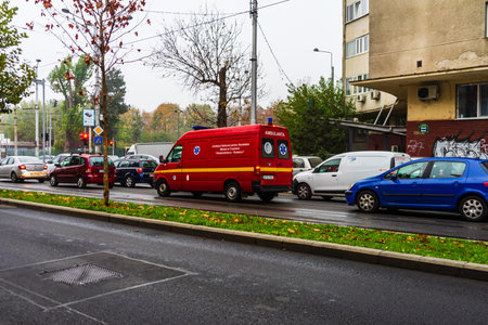 Traffic on the main boulevard in downtown Bucharest. Junction with stopped cars waiting for green...