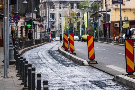 Victoriei Way (Calea Vitoriei) under capital repairs in the autumn. Construction site in downtown Bucharest, Romania, 2019のeditorial素材