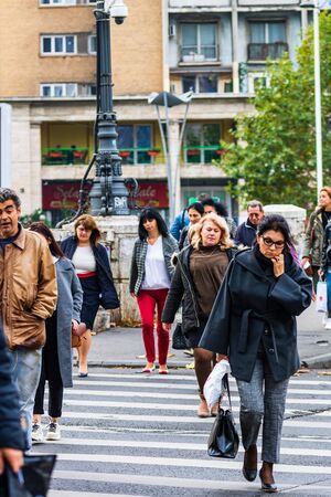 Pedestrians crossing the street in an autumn morning in Bucharest, Romania, 2019のeditorial素材