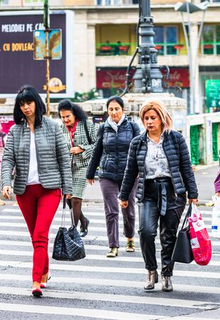 Pedestrians crossing the street in an autumn morning in Bucharest, Romania, 2019のeditorial素材
