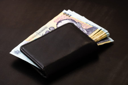 Man wallet with money on the table, wallet with dollars