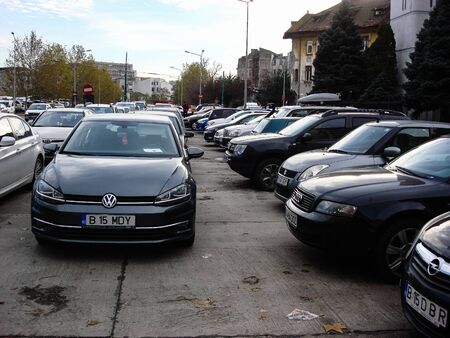 Cars parked in the parking lot. Bucharest, Romania, 2019.のeditorial素材