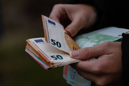 Woman counting money, counting EURO close upの写真素材