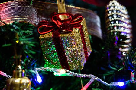 Christmas hanging decorations on fir tree. Decorated Christmas tree.  Fir branches with Christmas decorations.の写真素材