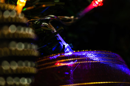 Christmas hanging decorations on fir tree. Decorated Christmas tree. Fir branches with Christmas...