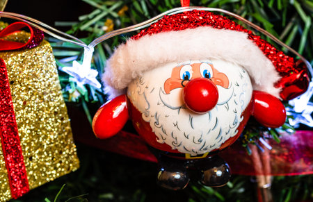 Christmas hanging decorations on fir tree. Decorated Christmas tree. Fir branches with Santa Claus...