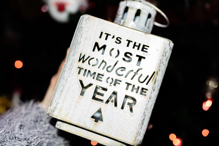 Christmas concept. Hand holding Christmas decoration. It is the most wonderful time of the year decoration.の写真素材