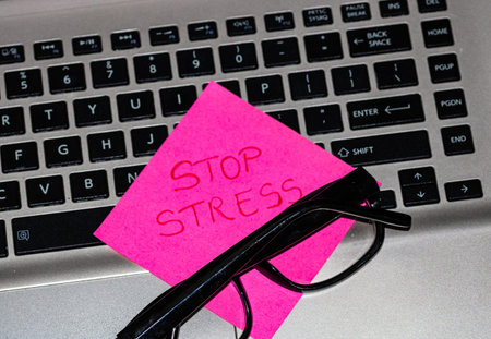 Writing on colorful sticky note Stop stress. Text with Stop stress on paper.