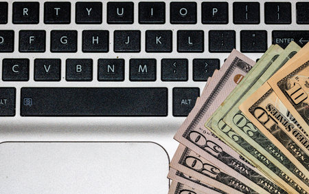 Close up of dollars money on keyboard.