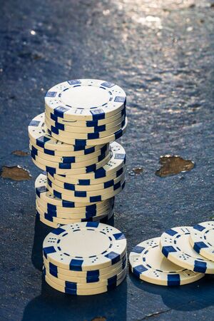 Poker game concept. Casino concept for business, risk,chance, good luck or gambling. Stack of Poker chips, close up, isolated.の写真素材