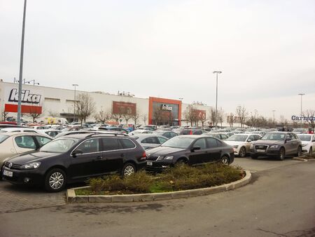 Cars parked, full parking lot in shopping center in Bucharest, Romania, 2019のeditorial素材