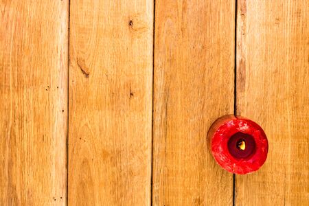 Detail view of candles on wooden background, top view, copy space for text, close up photoの写真素材
