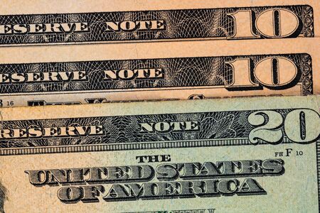 Detail of dollars money on table. Macro shot, close up photo of money. Business concept.の写真素材