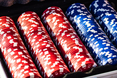 Poker chips close up background. Casino concept, risk, chance, good luck or gambling. Detail of...