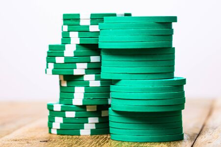Poker casino chips stacks close up. Casino concept, risk, chance, good luck or gambling. Detail of casino chipsの写真素材