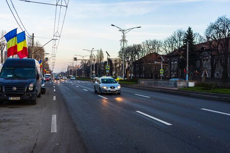 Car traffic at sunset on the streets of Bucharest, Romania, 2020のeditorial素材