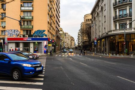 Traffic on the main boulevard in Bucharest downtown. Winter morning in Bucharest, Romania, 2020のeditorial素材