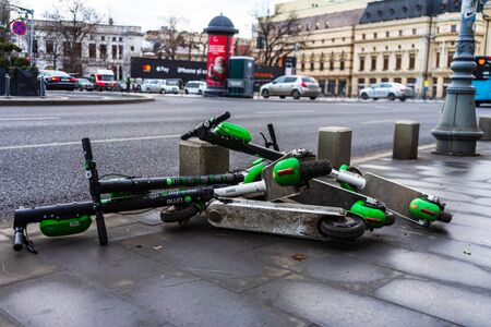Abandoned Lime-S electric scooter of the company Lime in the street in Bucharest, Romania, 2020のeditorial素材