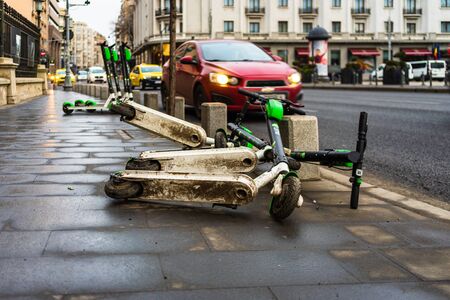 Abandoned Lime-S electric scooter of the company Lime in the street in Bucharest, Romania, 2020のeditorial素材