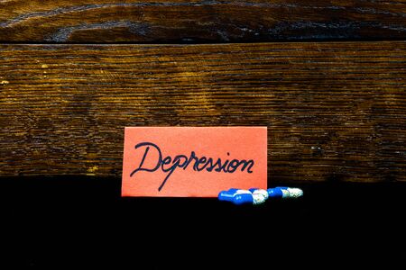 Writing Depression on label. Label with text Depression and medicines, pills.の写真素材