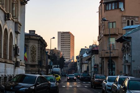 Car traffic on the main boulevard in Bucharest downtown. Winter morning/evening rush hour in Bucharest, Romania, 2020のeditorial素材