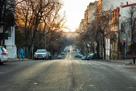 Car traffic on the main boulevard in Bucharest downtown. Winter morning/evening rush hour in Bucharest, Romania, 2020のeditorial素材