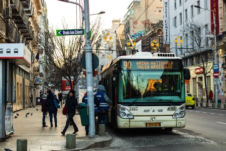 Car traffic on the main boulevard in Bucharest downtown. Winter morning/evening rush hour in Bucharest, Romania, 2020のeditorial素材