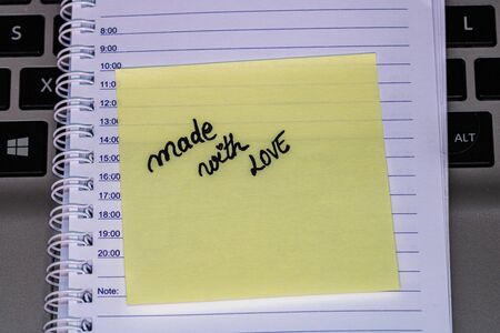 Writing love text on memo post reminder. Sticker with lovely message. Text on notepaper.の写真素材