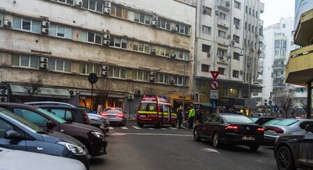 Police, and SMURD ambulance on duty. Accident on Victoriei Way (Calea Victoriei) Boulevard in Bucharest, Romania, 2020のeditorial素材