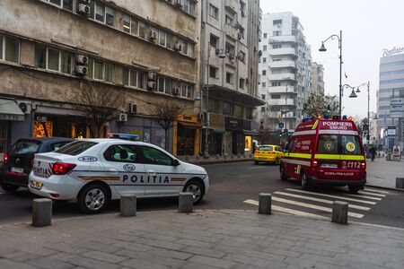 Police, and SMURD ambulance on duty. Accident on Victoriei Way (Calea Victoriei) Boulevard in Bucharest, Romania, 2020のeditorial素材