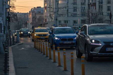 Morning and evening rush hour, stopped cars and heavy traffic on the main boulevard of Bucharest, Romania, 2020のeditorial素材