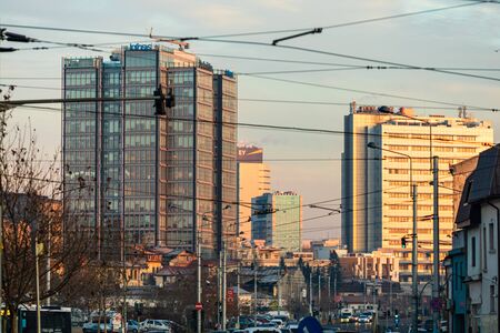 Traffic jam and new buildings architecture in the morning light. Berzei boulevard in Bucharest, Romania, 2020のeditorial素材
