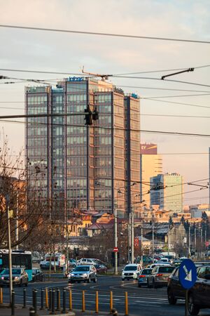 Traffic jam and new buildings architecture in the morning light. Berzei boulevard in Bucharest, Romania, 2020のeditorial素材