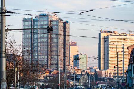 Traffic jam and new buildings architecture in the morning light. Berzei boulevard in Bucharest, Romania, 2020のeditorial素材
