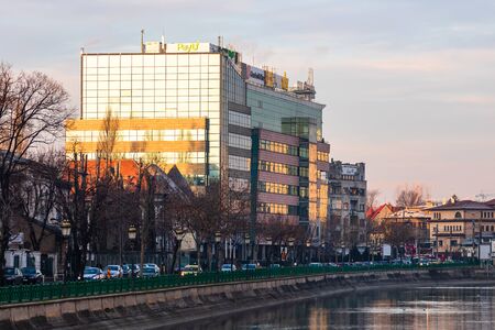 Early morning traffic in downtown area of Bucharest. View over the Dambovita river in a winter morning. Bucharest, Romania, 2020のeditorial素材