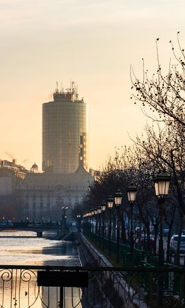 View of the Old Town of Bucharest from a bridge over Dambovita river, in the morning foggy light, Bucharest, Romania, 2020のeditorial素材