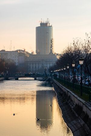 View of the Old Town of Bucharest from a bridge over Dambovita river, in the morning foggy light, Bucharest, Romania, 2020のeditorial素材
