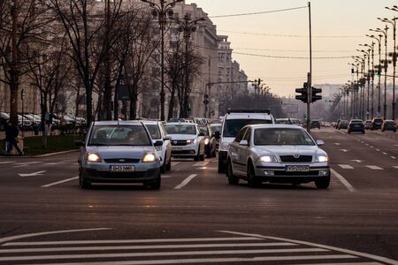 Morning and evening rush hour, stopped cars and heavy traffic on the main boulevard of Bucharest, Romania, 2020のeditorial素材