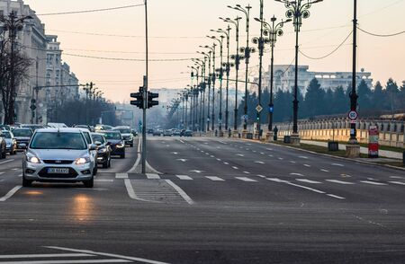Morning and evening rush hour, stopped cars and heavy traffic on the main boulevard of Bucharest, Romania, 2020のeditorial素材