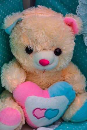 Teddy Bear toys with handmade Valentineâs day love heartsの写真素材