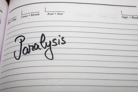 Paralysis, handwriting text on page of office agenda. Copy space.の写真素材
