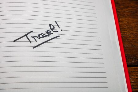Travel, handwriting text on page of office agenda. Copy space.の写真素材