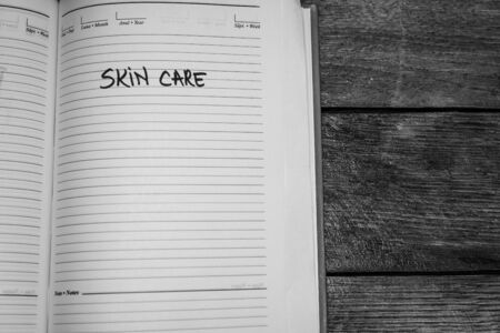 Skin care, handwriting text on page of office agenda. Copy space.のeditorial素材