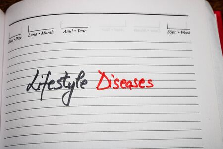 Lifestyle diseases, handwriting text on page of office agenda. Copy space.のeditorial素材