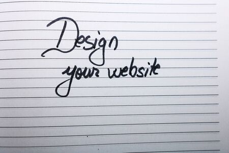 Design your website, handwriting text on page of office agenda. Copy space.の写真素材