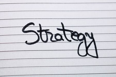 Strategy, handwriting text on page of office agenda. Copy space.の写真素材