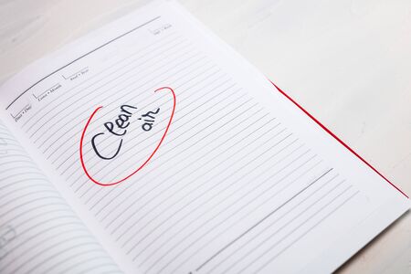 Clean air, handwriting text on page of office agenda. Copy space.の写真素材