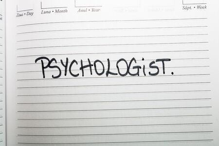 Psychologist, handwriting text on page of office agenda. Copy space.の写真素材